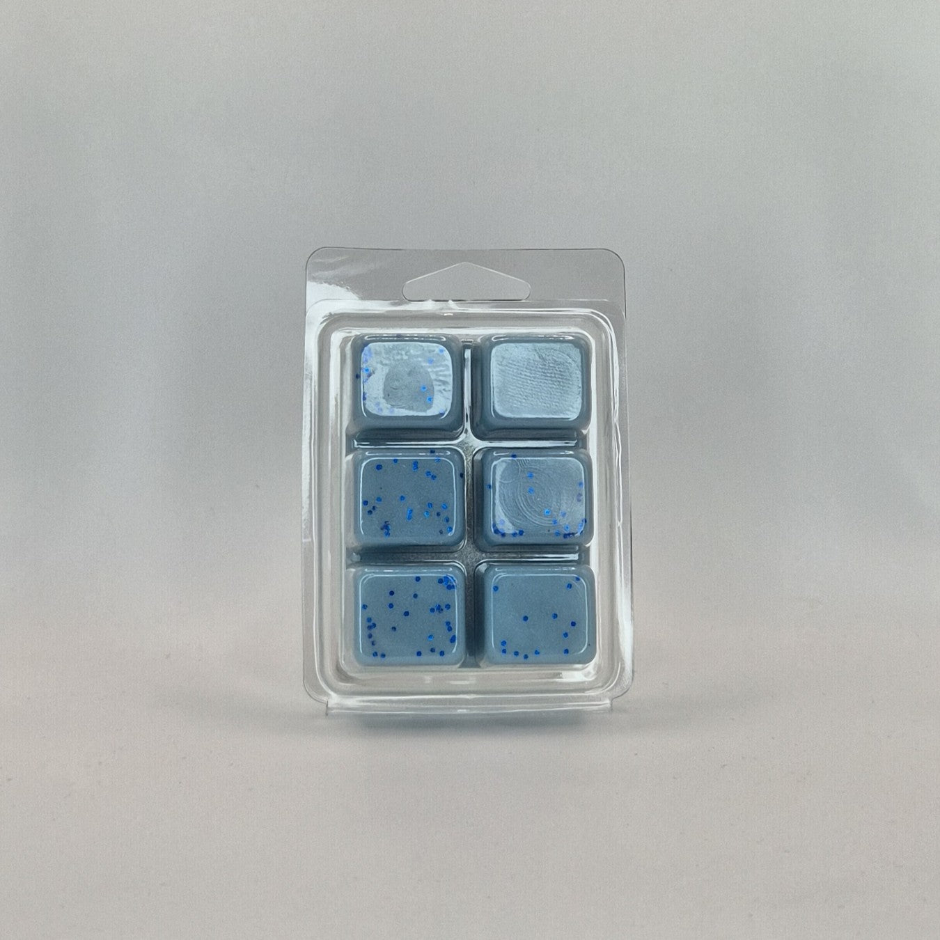 Fondant Clamshell de couleur bleu parfum Cachemire et soie