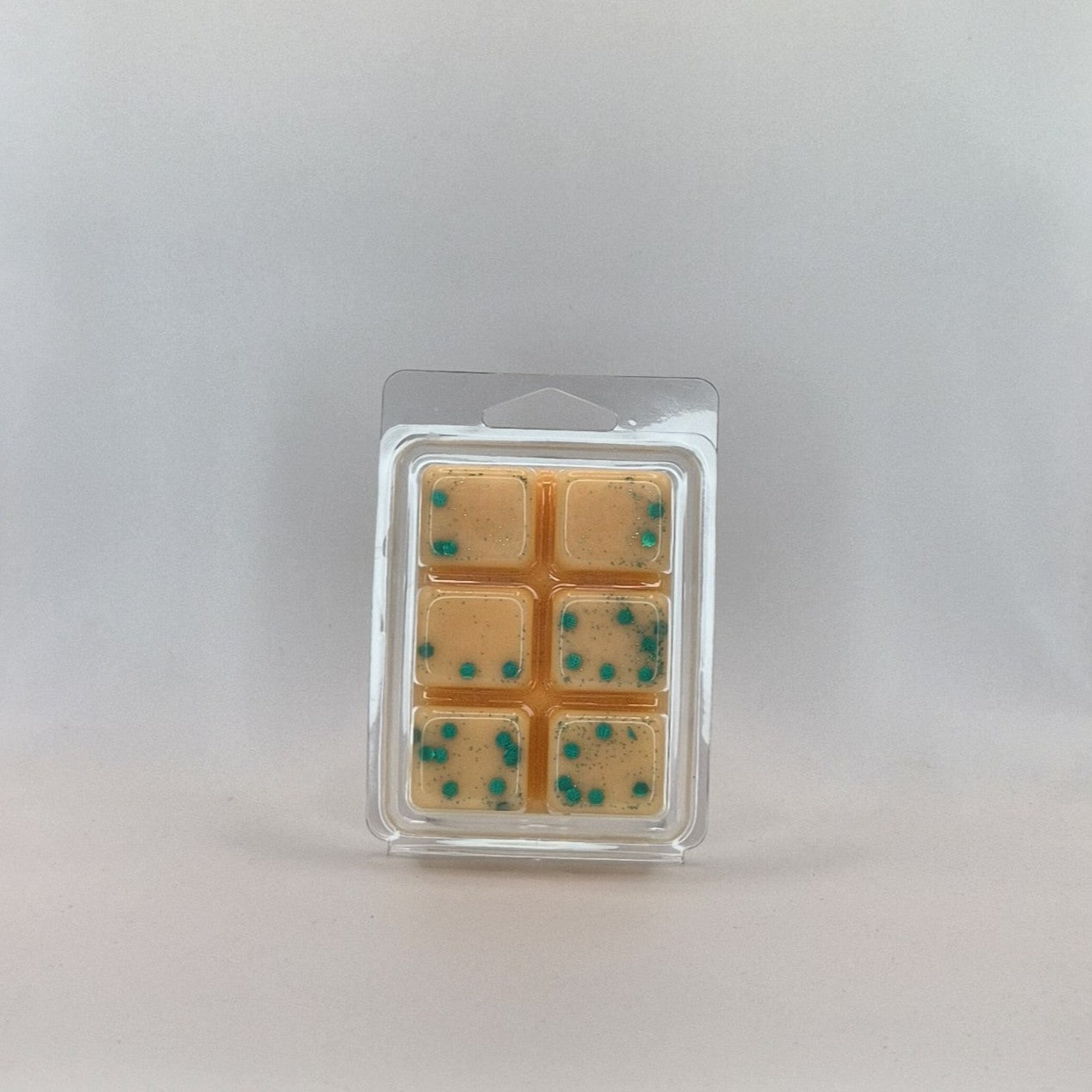 Fondant Clamshell parfumé de couleur orange parfum Abricot romarin