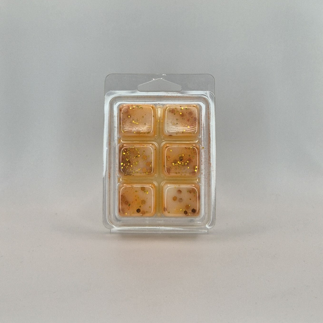 Fondant Clamshell parfumé de couleur orange parfum Monoi peche